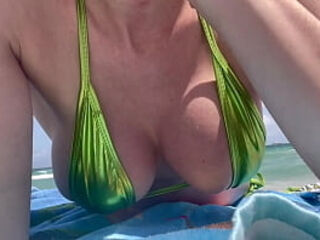 Italian yam-sized baps cougar Artemisia enjoy at the Public Beach in Miami dressed in a micro swimsuit